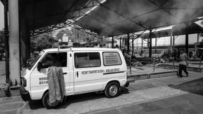 An ambulance parked at the entrance of a Covid-19 cremation ground in New Delhi