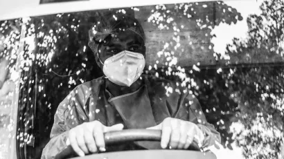 An ambulance driver, on duty in New Delhi during the Covid-19 pandemic
